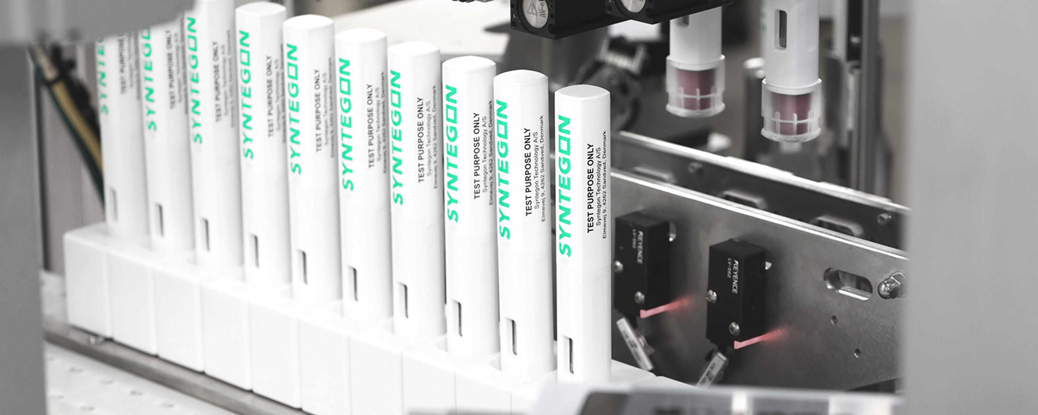 Auto Injector Labeling Medical device assembly, labeling, handling & packaging » Syntegon